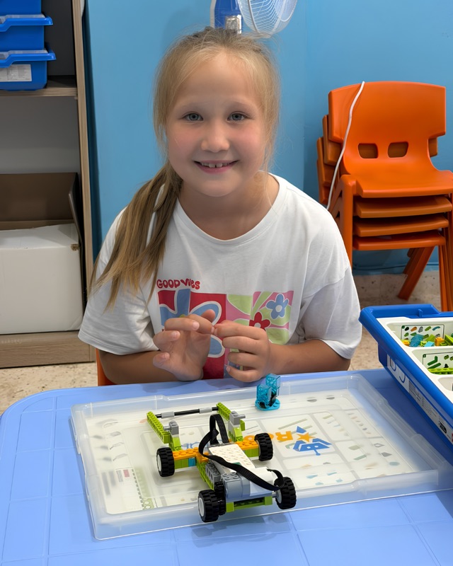 RoboStars student with an advanced wheeled robotics build